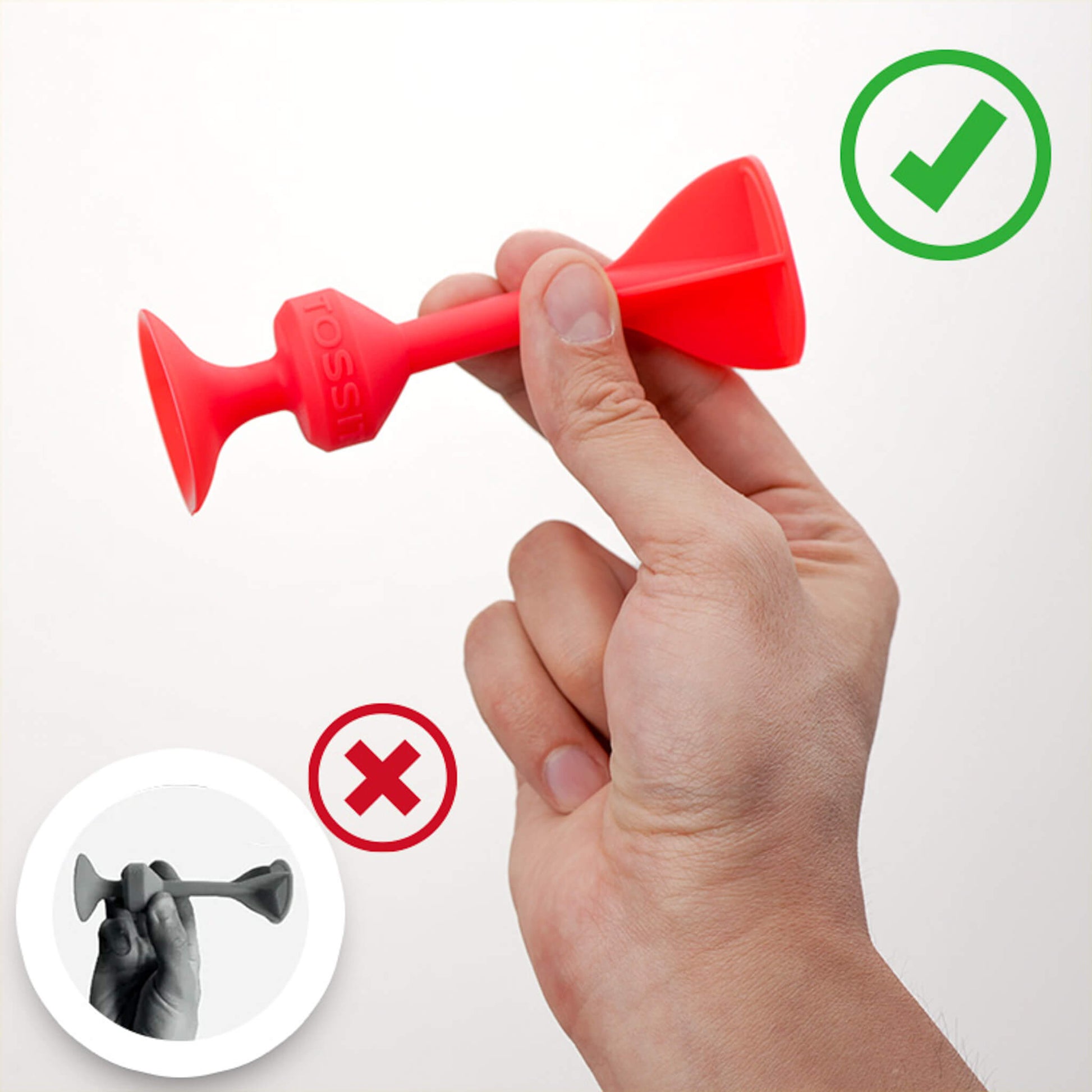 He aquí cómo sujetar correctamente el dardo Tossit al lanzarlo.